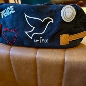 NEVER USED - PEACE LOVE WORLD makeup bag